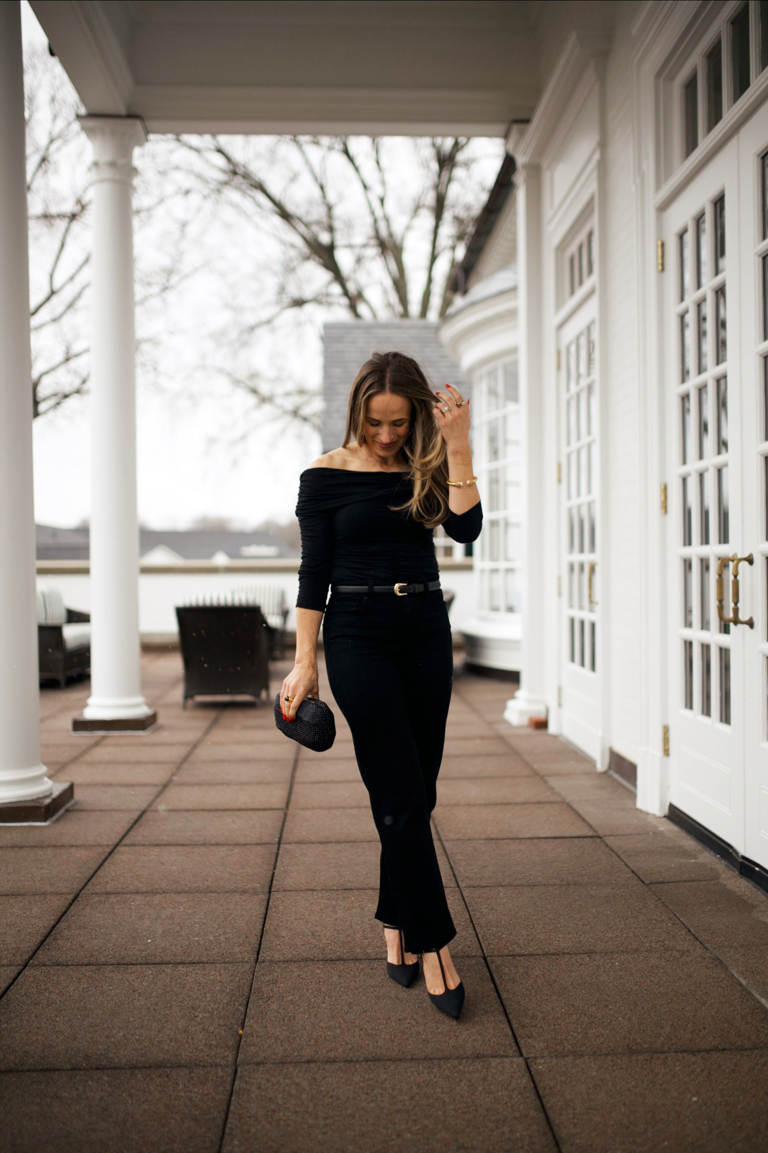 New Year's Eve Outfit - Off the shoulder top, black jeans, black leather belt, black pointed heels, black clutch 

 #LTKHoliday #LTKootd #LTKSeasonal