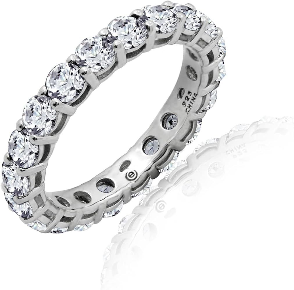 Amazon Collection Platinum or Gold Plated Sterling Silver All-Around Band Ring set with Round Infini | Amazon (US)