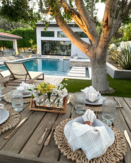 Al fresco dining…the prettiest neutral, organic chargers, napkins and napkin rings that elevate our favorite everyday stoneware dishes! 
These glasses are acrylic and poolside safe. The sweetest vase with endless options to decorate with
Love 🖤
Backyard design 
Pool design 

#LTKParties #LTKSeasonal #LTKHome
