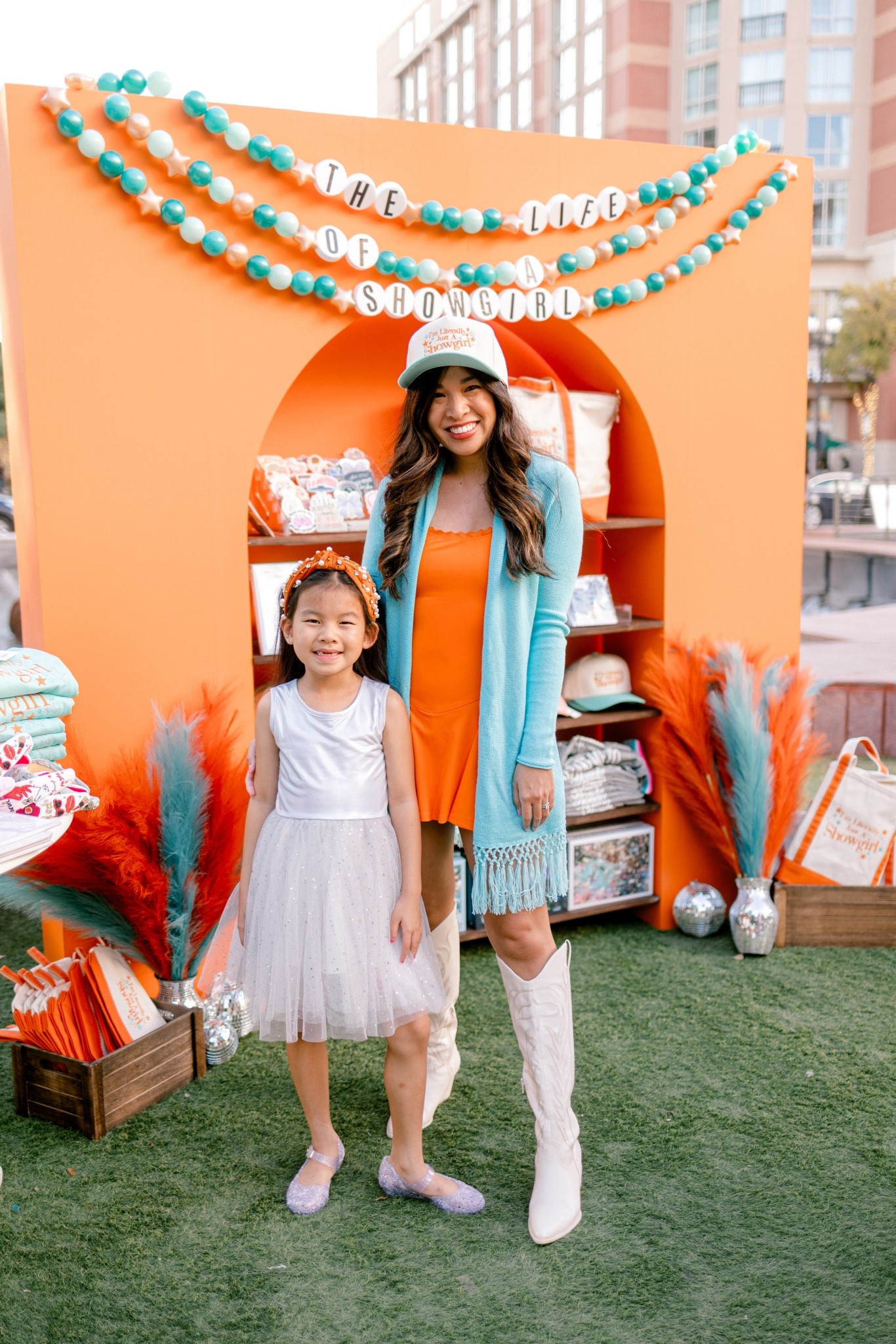 Showgirl inspired outfits 🧡✨🪩

Wearing size XS in the dress. It has built in shorts! 

My hat is from @curatorandco! 
