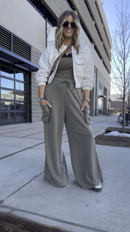 Sunday finday OOTD

Jumpsuit - large, 2 colors. Is a tad short but layered it with a tank underneath and it’s so cute! Also super easy to wear as pants (tuck in the top part and pair with a graphic tee)
Tank - large
Jacket - large
Sneakers - 11 

#LTKVideo #LTKmidsize