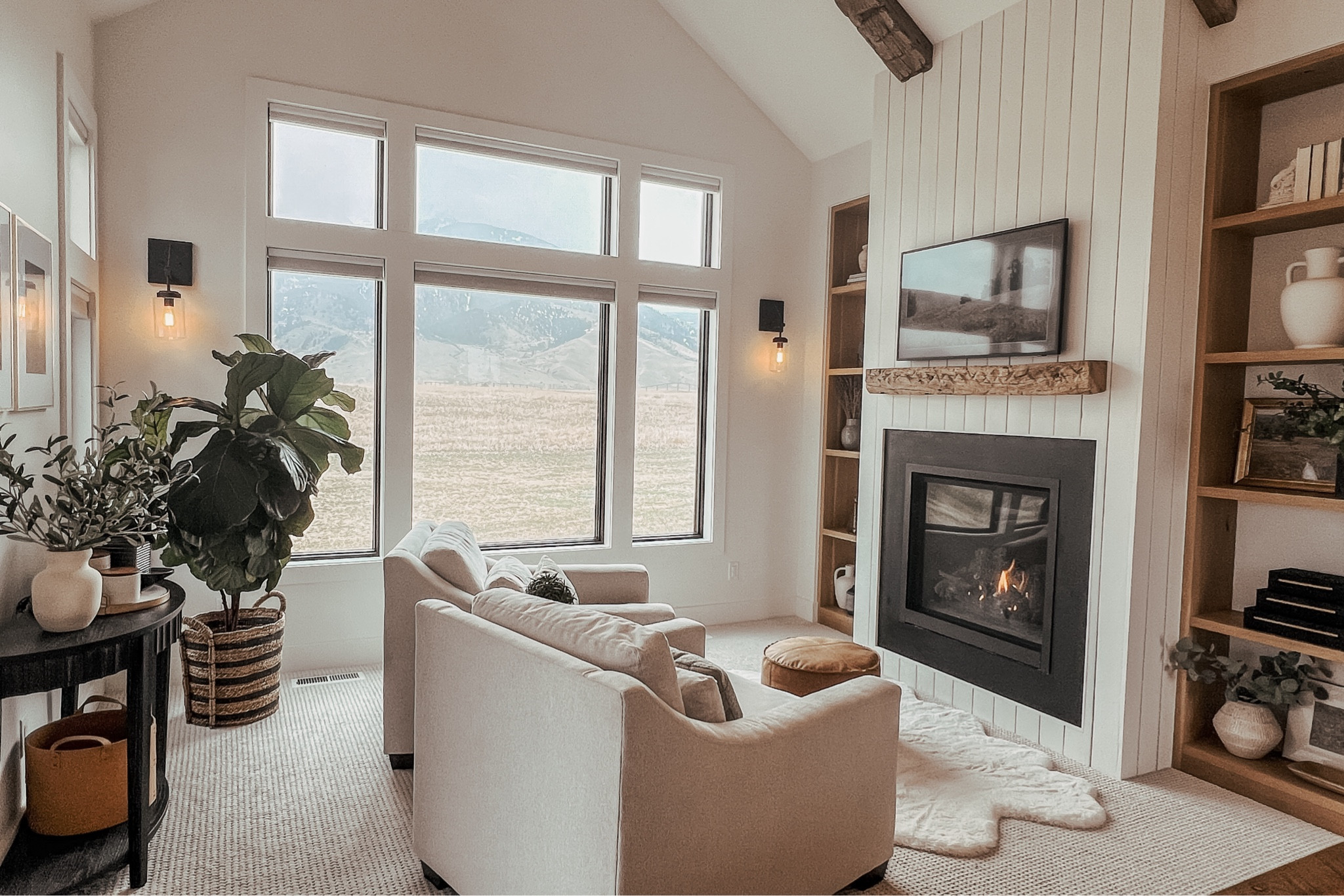 Master bedroom sitting area, built ins and coffee bar!

Gas fireplace, built in shelves, master bedroom, master sitting area, faux sheepskin rug, ottoman, deep chairs, pottery barn chairs, comfy reading chairs, round side table, brass side table, plants, books, book ends, antique basket, carved wood bowl, black stacking boxes, antique vase, european antique, pottery bowl, frame TV, reclaimed wood mantle, wood beam, fireplace mantle, coffee bar, bedroom coffee nookk

#LTKHome