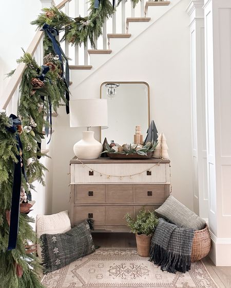 Last year’s staircase garland! I absolutely love how whimsical and forest-like our holiday garland looked last year! I used a ton of fillers and stems to create a full look. I used my favorite garland from Brooke & Lou, but the Afloral options are more affordable and in-stock! I love those options too!

#LTKHoliday #LTKstyletip #LTKhome