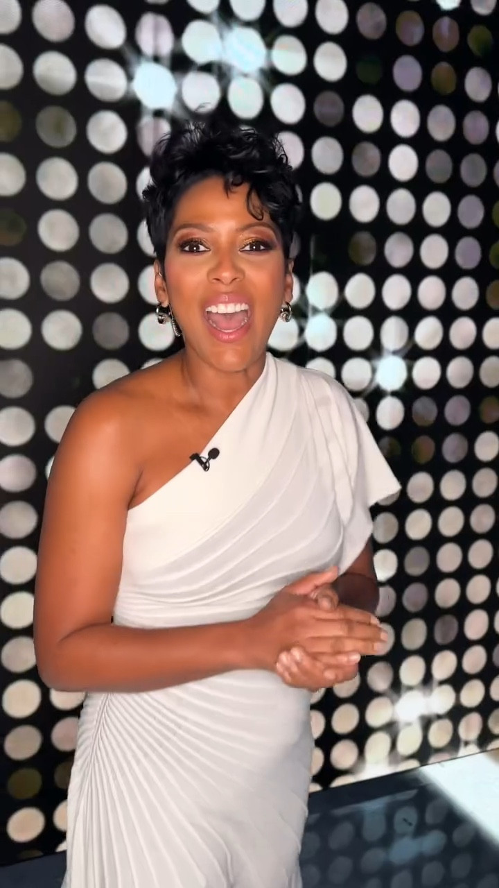 Tamron Hall in Alaia asymmetrical knit dress