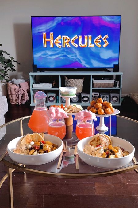 Hercules movie night idea!! 💪🏼🏺🏛️✨ #athenospartner I had so much fun thinking up ideas for this one!! 😁👏🏼@athenosfeta new whipped feta dip and spread is a game changer to level up movie night! I used it as a veggie dip and to top the Greek chicken sheet pan.  It’s so versatile. No need to whip out the blender, @athenosfeta whipped it for me to create a bit more simplicity to my life! You can find it at your local @Walmart Supercenter nationwide!! 

THE SPREAD:
Greek Pita Bread 
Greek Chicken Sheet Pan topped with Athenos Whipped Feta Dip & Spread
Greek Donuts
Mortal Potion 

PS. The Greek chicken sheet pan is SO good that the hubby requested I make it weekly!! 

**full recipes are on my blog: www.CheapChicFinds.com 

✨SHOP the links in my bio, my story or comment below & I can send you the links to shop or the blog post with the full recipes!

#athenoswhippedfeta #greekfood #whippedfeta #disneymovienight #herculesmovienight #whippedfetarecipes


#LTKparties #LTKfamily #LTKhome