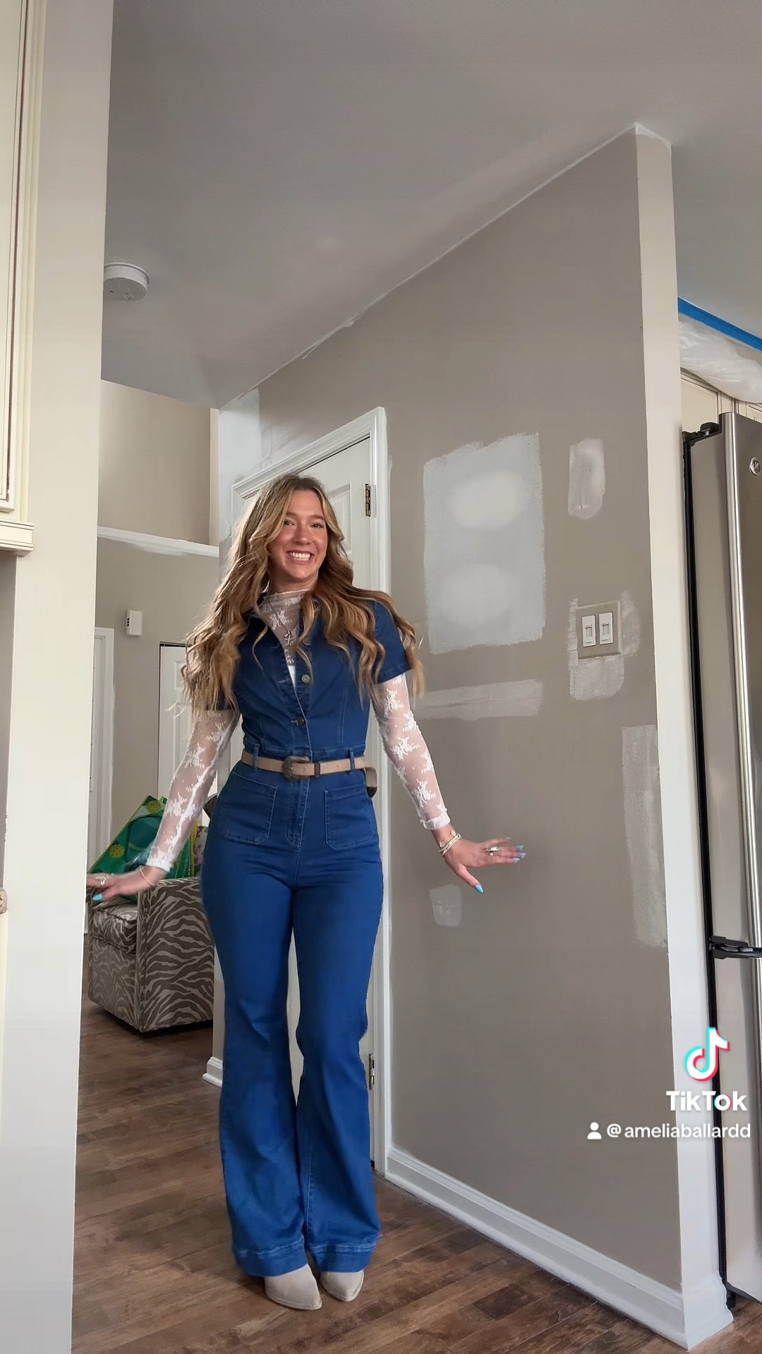 Country concert outfit inspo! This jumpsuit is the softest & stretchiest denim I’ve ever felt. It was so comfy to dance around in all night and I added this Amazon lace layering top and Free People belt to jazz it up a little. The jumpsuit is from Windsor two years ago but I linked tons of similar options! :) 

#LTKStyleTip #LTKFestival #LTKSeasonal