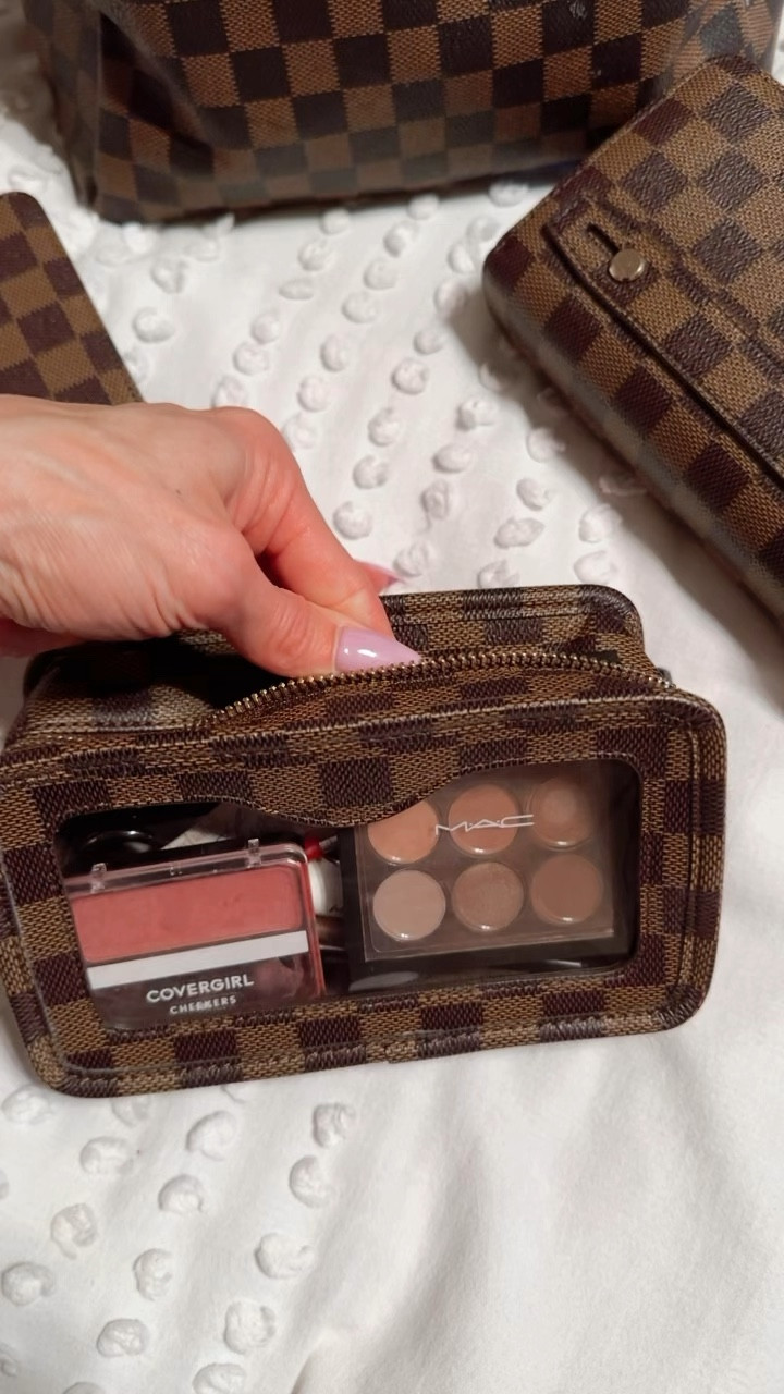 Affordable checkered dupes that are great quality. 🤎 
My favorite are the tiny checkered make up bag, the checkered passport holder, and the large checkered toiletry bag (that holds a ton!) These cute pieces make travel organization easy and chic. 

#LTKTravel #LTKItBag #LTKFindsUnder50