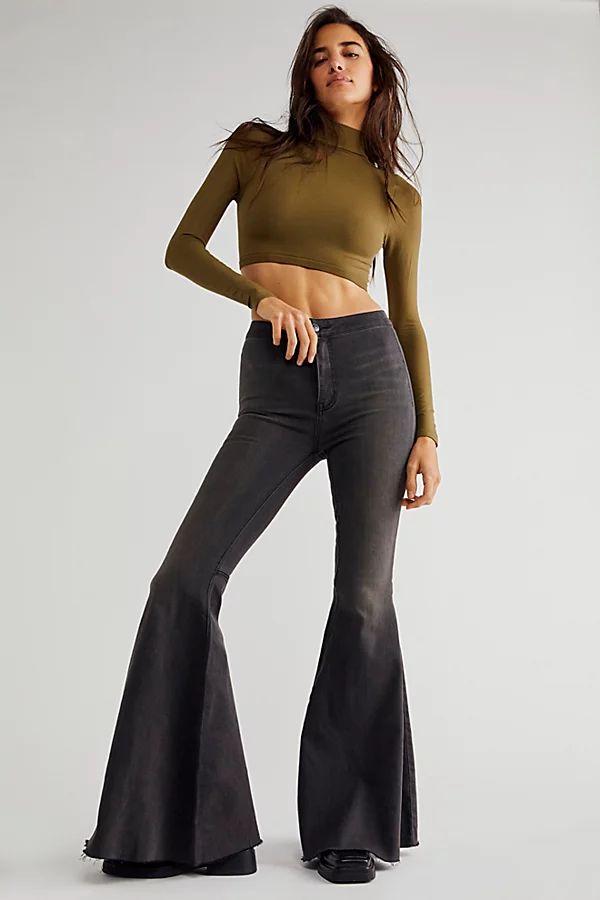 Just Float On Flare Jeans by We The Free at Free People, Washed Black, 29 L | Free People (Global - UK&FR Excluded)