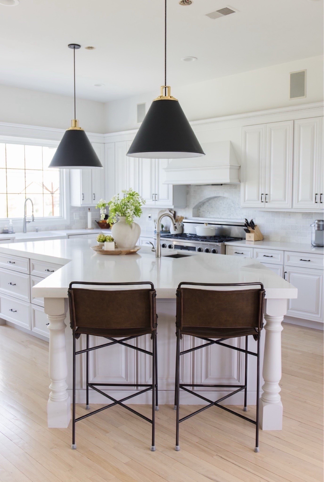 Kitchen pendants, kitchen stools, kitchen decor #archedmanor #modernhome #neutralhome #homedecor #casualstyle #neutralstyle 

#LTKSummerEdit 

#LTKSeasonal #LTKHome