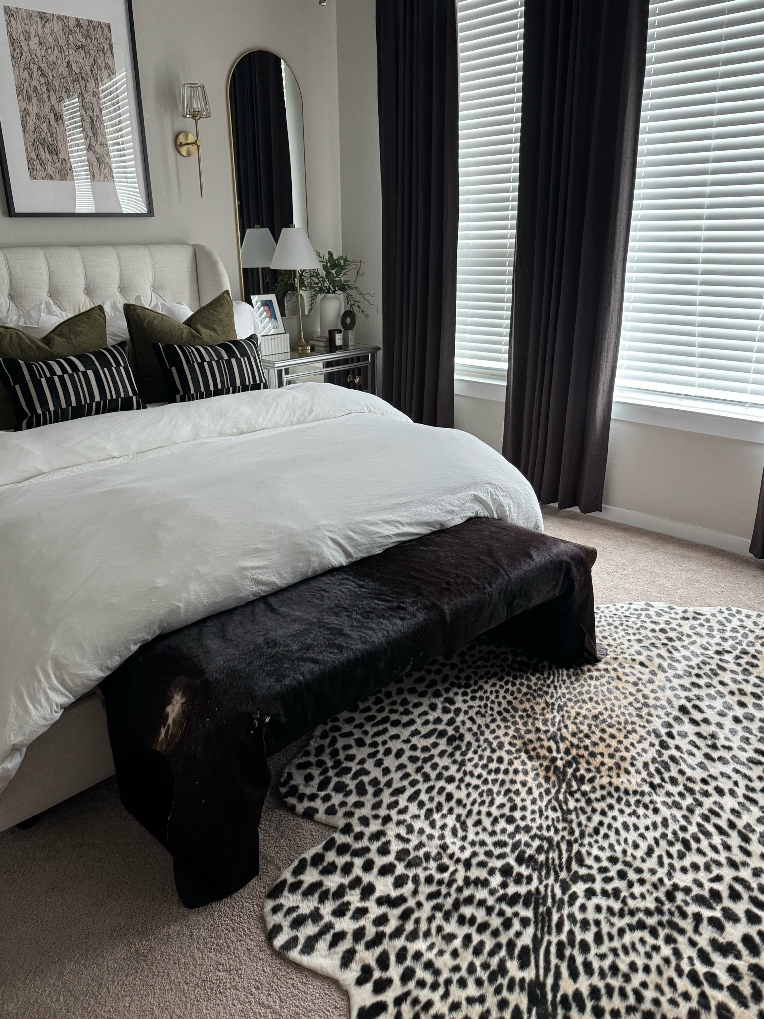 I have been obsessing over animal print lately, so naturally, I needed to find a way to tie it into our bedroom! I wasn’t in the market for new furniture just yet, but a few simple changes—like darker curtains, moody pillows, a DIY cowhide bench, and this stunning leopard rug—made my vision and new obsession come to life.

Bedroom, decor, master bedroom, Modern bedroom, Glam bedroom, chic bedroom, interior design, cheetah, rug, leopard rug, bedroom makeover, animal print pillows, cowhide decor, sale, home, decor, room decor ideas, Moody bedroom ideas

#LTKHome #LTKSaleAlert #LTKdayinmylife