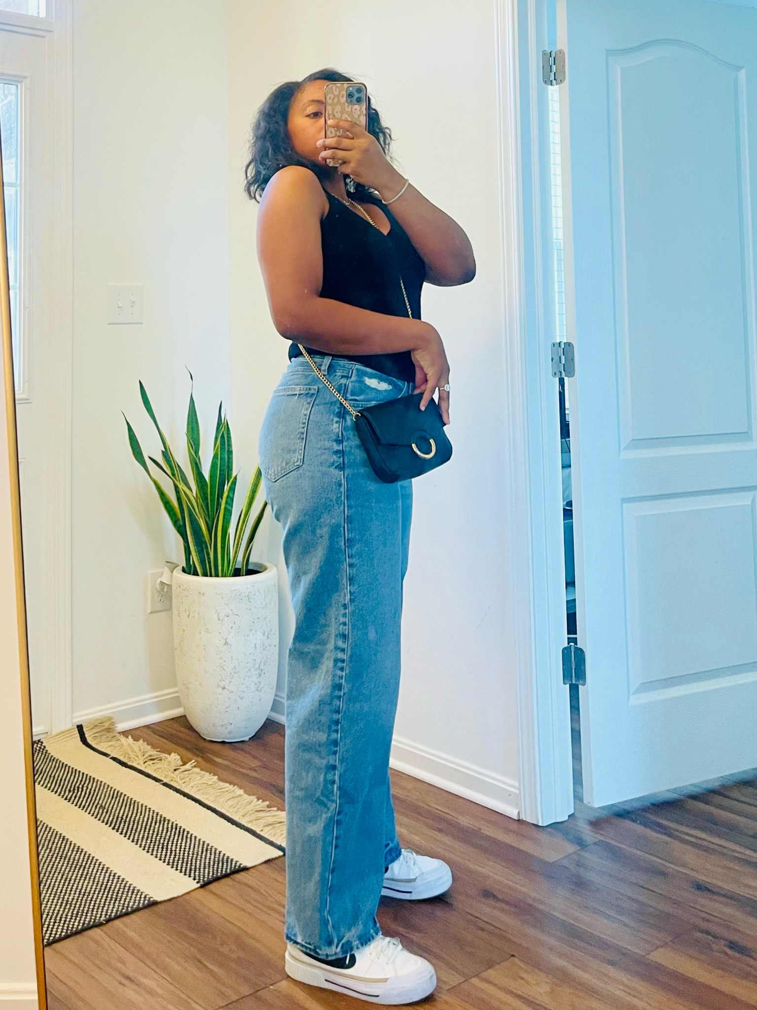 Easy look for an active date night. We love to go to top golf and I love a simple transitional piece. Love these high waisted 90s baggy style jeans. I paired it with a comfortable v neck tank! Details linked! 

#LTKFindsUnder50 #LTKBacktoSchool #LTKShoeCrush