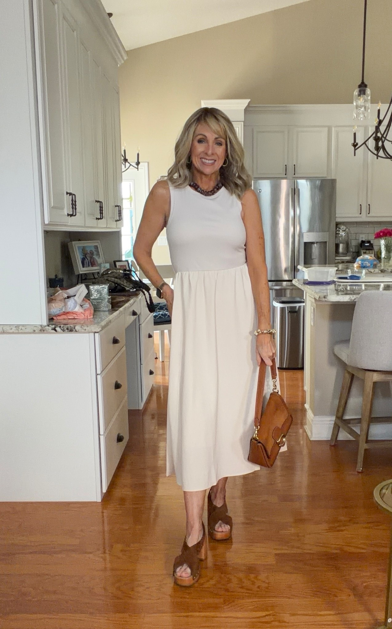 Cutest dress for spring and summer! Love it with cognac accessories. 

#LTKOver40 #LTKootd