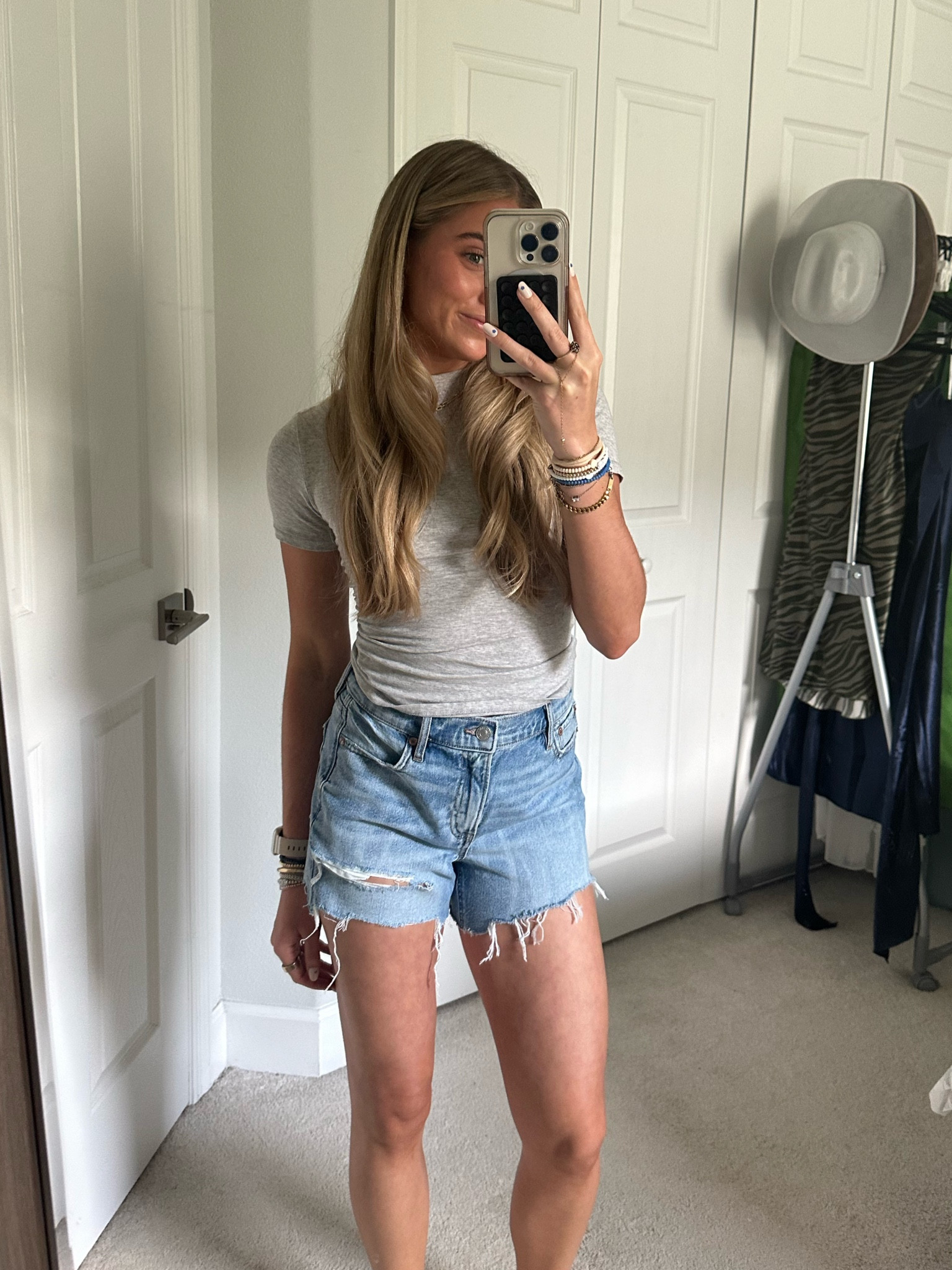 AE Strigid Super High-Waisted Relaxed Distressed Denim Short. Wearing size 0. A super high rise & relaxed fit for an effortlessly stylish warm weather staple. Rigid in the front. Stretchy in the back. Magic all over with innovative 50/50 construction. Light wash, Distressed, Raw hem. #AEpartner #AEjeans @americaneagle American Eagle. American Eagle outfitters. Denim shorts. Jean shorts. 

#LTKSeasonal #LTKfindsunder50 #LTKsalealert