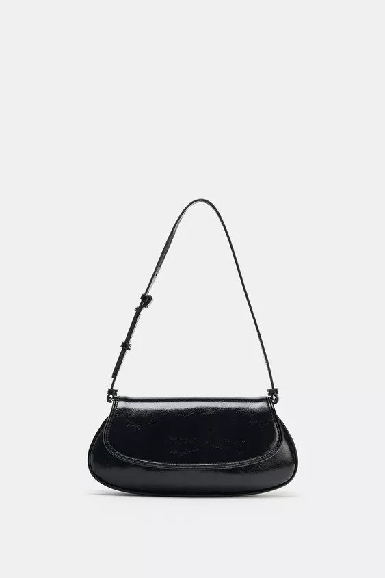 DescriptionColorContentsMeasurementsShoulder bag. Adjustable shoulder strap. Interior zip pocket.... | Zara US