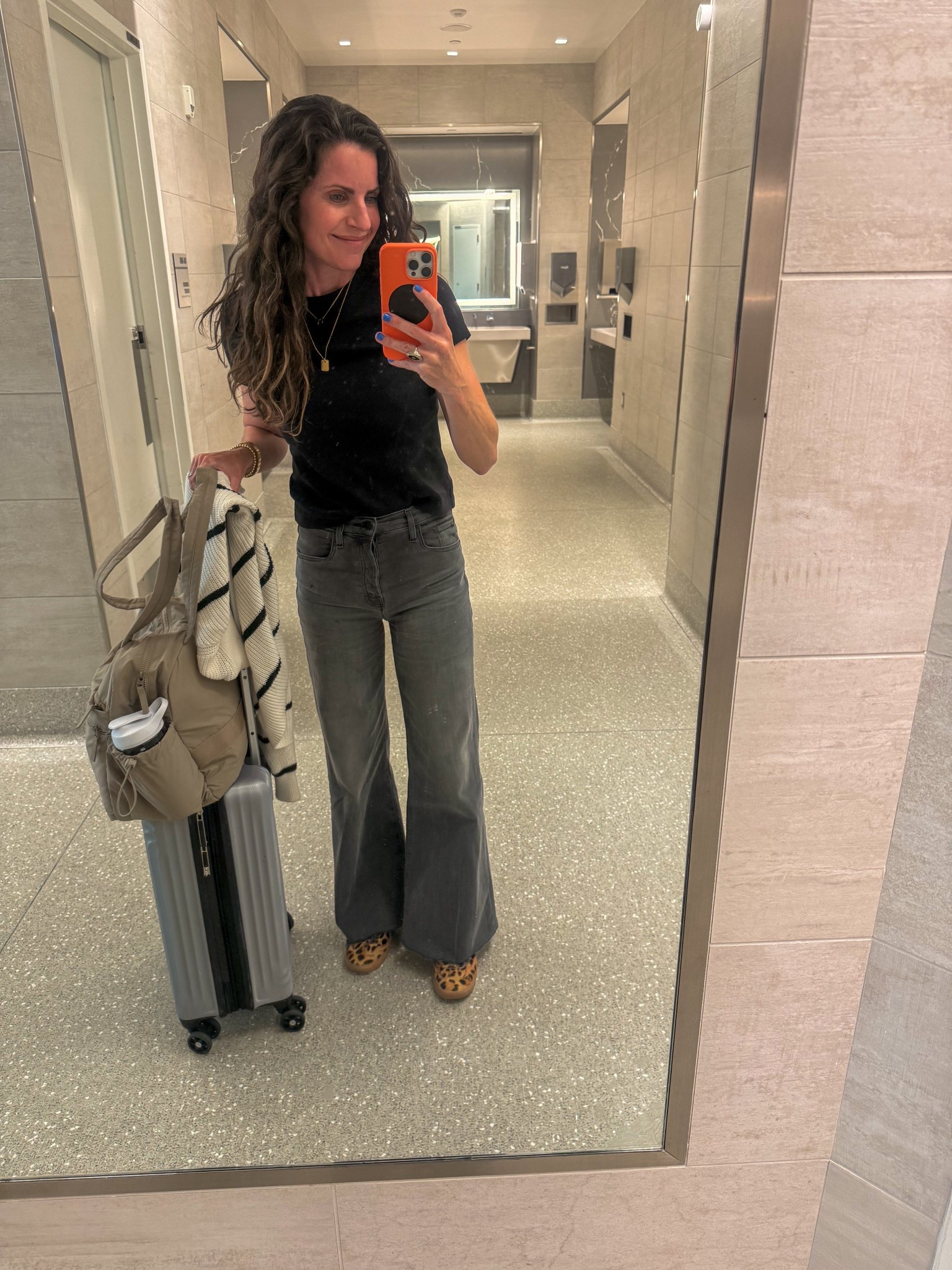 These jeans are so comfy. TTS and I cut mine off one more inch to wear with sneakers. Love this gym bag too for a carry on. I have my small purse in it  #LTKMothersDay

#LTKOver40 #LTKTravel