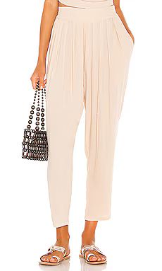 Indah Tanah Solid 80s Pleated Trouser in Doe from Revolve.com | Revolve Clothing (Global)