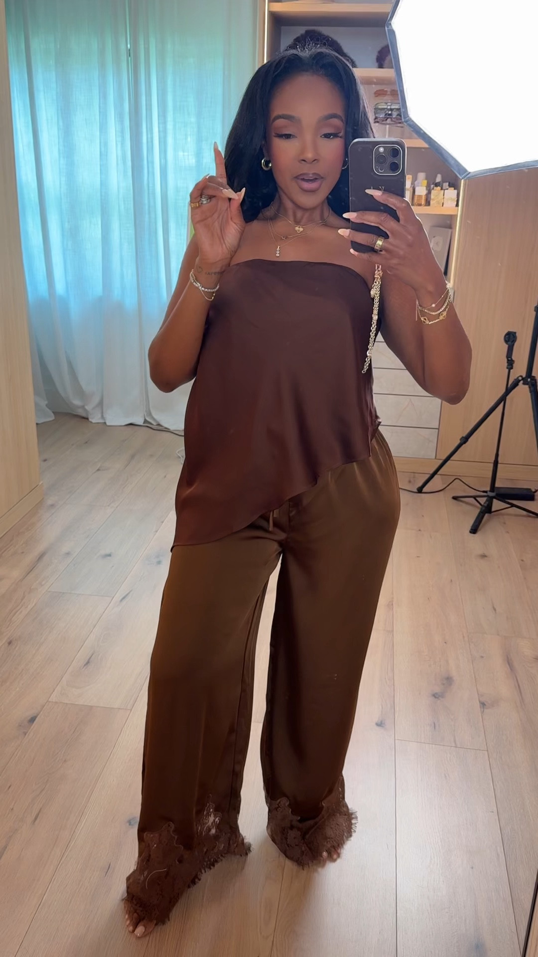 Scroll to shop this chocolate satin set 🤎

This matching top and pant set with lace trim is effortlessly chic and gives that luxe, put-together feel—perfect for date nights, girls night, or vacation dinners.

📏 Measurements: 5’4”, 140 lbs, 34D bust, 27” waist, 40” hips

Follow me on Instagram and YouTube @kirasfashionfinds 