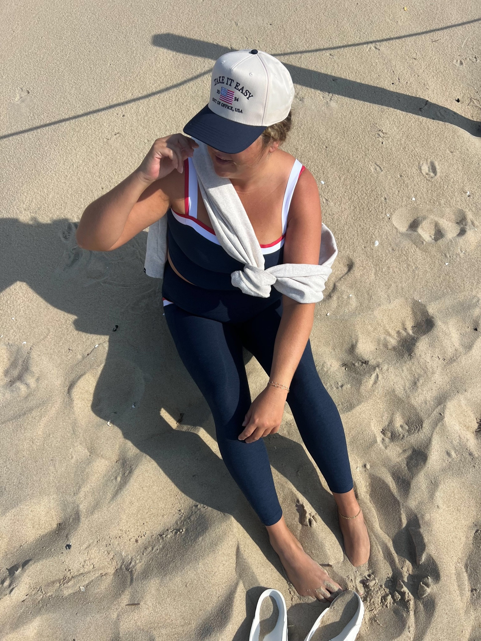 Cute Americana athleisure outfit! I love this Beyond Yoga set, Perfect for yoga, brunch, errands and beach walks! I paired it with this adorable trucker hat, a sweatshirt and rubber Birkenstock flip flops (the best beach shoes)! Casual outfit idea, athleisure outfit idea, coastal granddaughter outfit idea, navy set, navy workout set, navy workout set, trucker hat, girly trucker hat, beach outfit idea 

#LTKFitness #LTKShoeCrush #LTKStyleTip