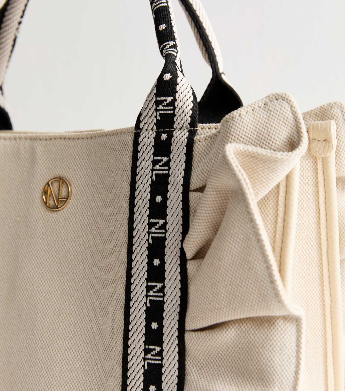 Cream Logo Trim Ruffled Canvas Tote Bag
						
						Add to Saved Items
						Remove from Saved I... | New Look (UK)