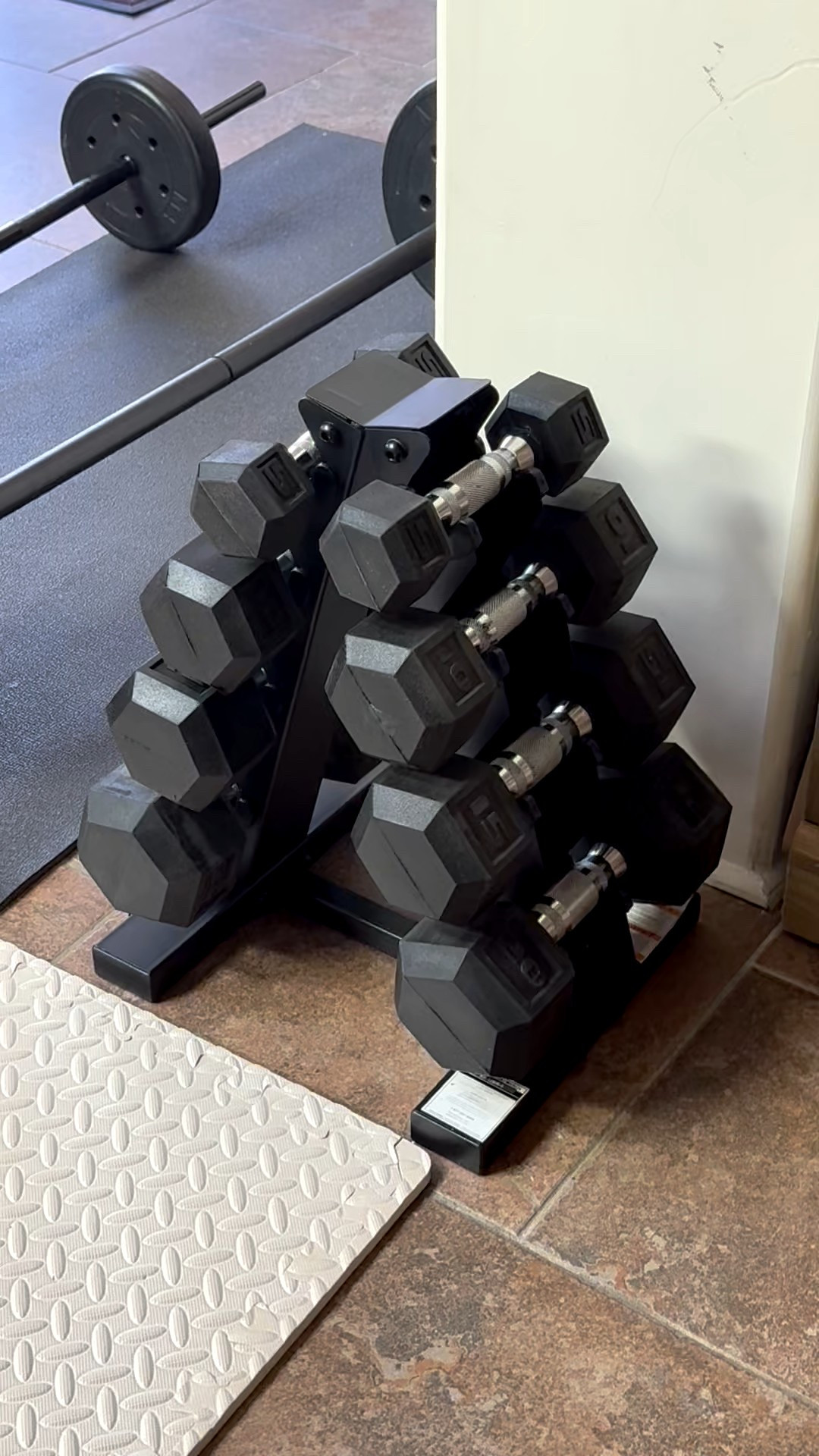 I was very excited when these arrived! I’m in the gym several times a week but when I can’t get there, these will come in handy. The rack took my husband about 20 minutes to put together. I suggest you have a wrench handy to help tighten the bolts.

I’ve tagged a few things we have in our home gym. 
I use the workout gloves all the time when I’m handling dumbbells and barbells with metal bars. Not only do they help with my grip, but when I get sweaty the bars don’t slip out of my hands. They are easy to wash and dry fast.
The mat you see underneath my bar bells has slightly changed. It is now foldable. I tagged the larger one from the same brand. The original one protects our floor just as well and I’m sure the newer one is even better.

I bought the interlocking floor tiles for when I practice Pilates and yoga. They offer extra cushioning that is still firm and easy on their joints when working out.

Our treadmill and an almost six years old and still going strong. We chose Sole because of its value, quality, and reviews. Neither one of us is a runner, but it gets daily use for moderate to high intensity walks. I like that it has several different programs, including HITT and open. Ours came with a heart monitor, Bluetooth speakers, phone/ipadholder, and plenty of room to put cups, keys, etc. we have the F80 model.

If you have any questions, I’m happy to talk gym equipment with you. Feel free to comment on this post. 

#LTKselfcare #LTKfitnessgoals 

#LTKActive #LTKGiftGuide