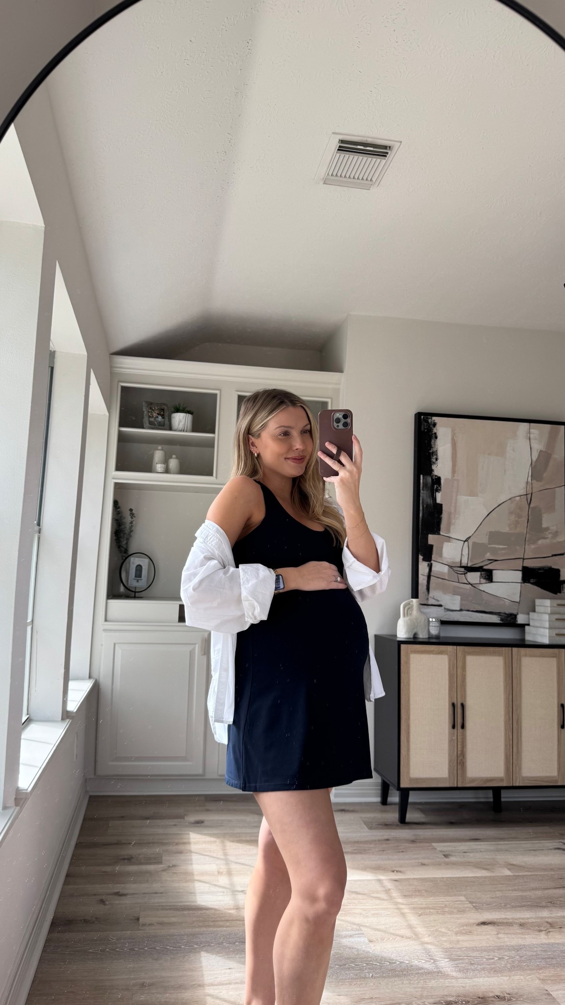 Bump friendly activewear dress | I love this dress because the shorts are not attached to the dress which is great for the bump. Wearing size M in dress and button up. Sandals are tts. 

#LTKBump #LTKStyleTip