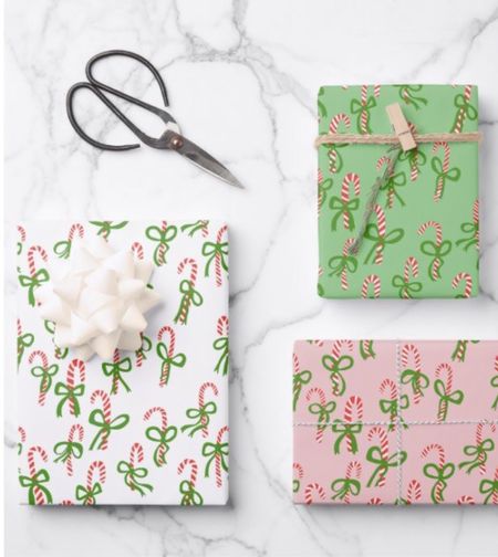 Holiday wrapping paper on SALE 
BOWS, candycanes, Santa mugs, ski lodge 

#LTKHoliday #LTKGiftGuide #LTKHolidaySale