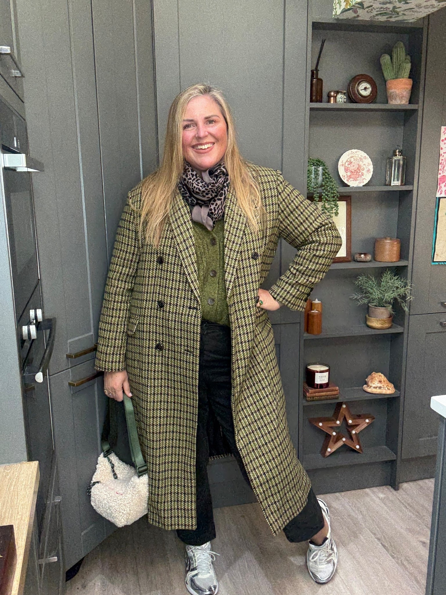 Green check overcoat, black cargo trousers, chunky green cardigan, leopard scarf, trainers, Borg bag 

#LTKplussize #LTKwinter #LTKcurves