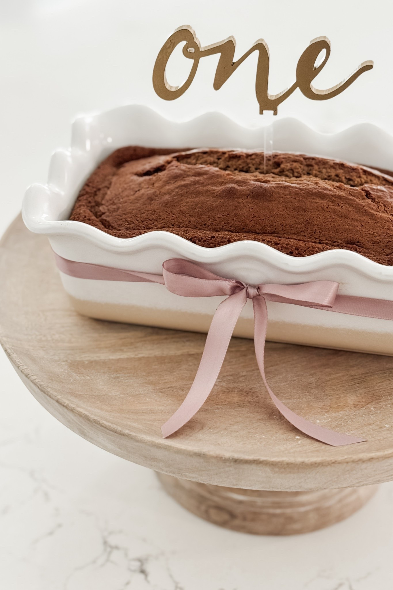 Chloe’s bow-themed First #BirthdayParty — applesauce cake 🎀🧁 (cream cheese frosting not pictured, but delicious!)

#LTKKids #LTKParties