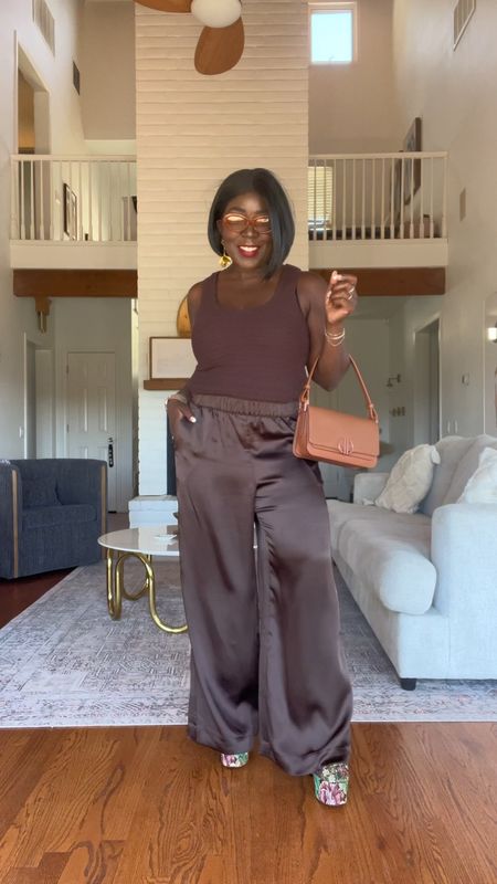 Absolutely gorgeous silky soft pants from LOFT! Wearing a size large!! Styled them with this LOFT sweater tank in a medium, platform heels, brown leather shoulder bag, gold earrings and some cute sunnies to finish the look!!

#LTKVideo #LTKstyletip #LTKshoecrush