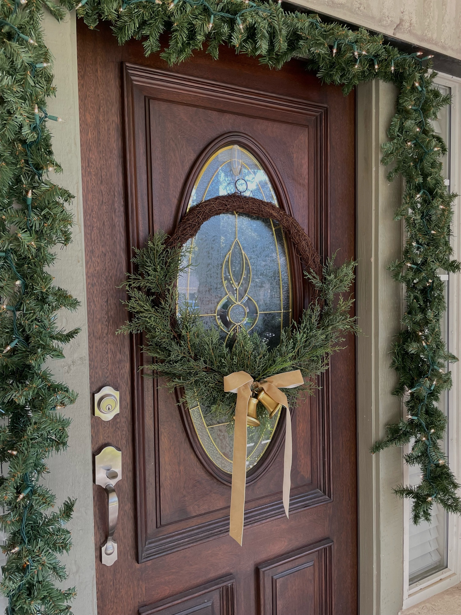 Christmas threw up on my front door and I love it!!! 🌲 used about 4 garland to achieve this look! 

#LTKHoliday #LTKSeasonal #LTKHome