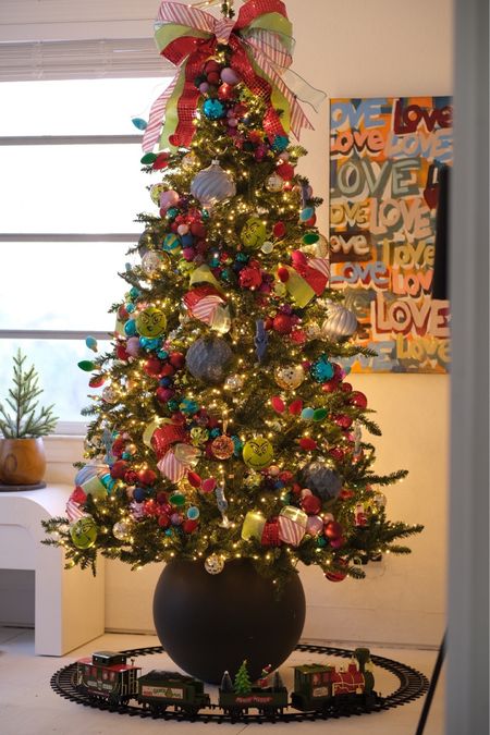 Grinch Christmas tree! The ornaments were an easy diy. #meandmrjones 

Christmas decor, colorful Christmas tree, grinch ornaments, 

#LTKhome #LTKHoliday #LTKfindsunder50
