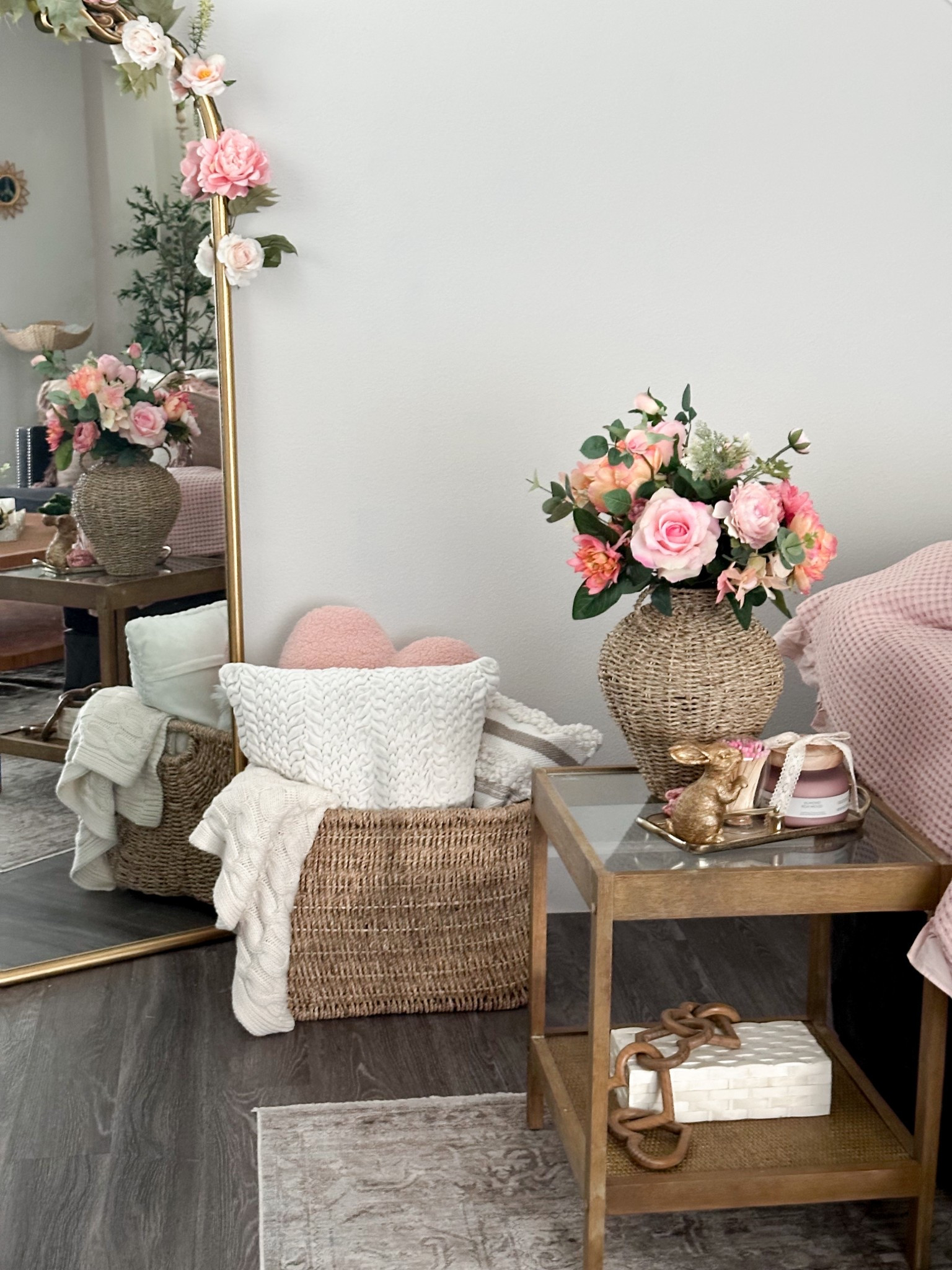 Loving the pink tones with the rattan and texture of wicker finishes such a soft, feminine spring cozy vibe. #springdecor #springvibes #pinkdecor #pinkflowers #archedtallmirror #goldmirror #flowergarland #basket #coquette #bohocoquette 

#LTKHome #LTKStyleTip #LTKSeasonal