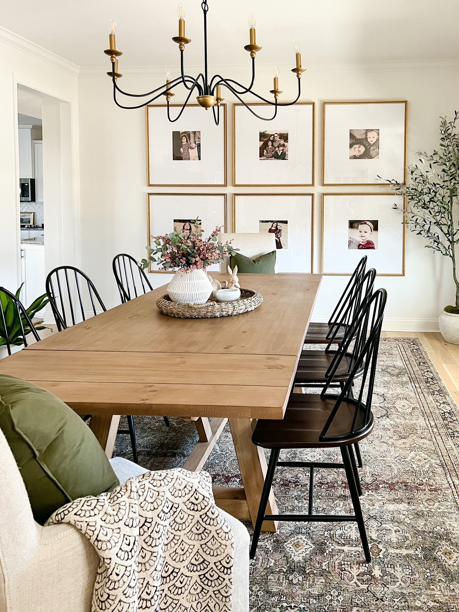 New dining room Loloi rug, farmhouse table, black dining chairs, oversized gold frames, chandelier, slipcover linen end chairs

#LTKFind #LTKhome #LTKunder50
