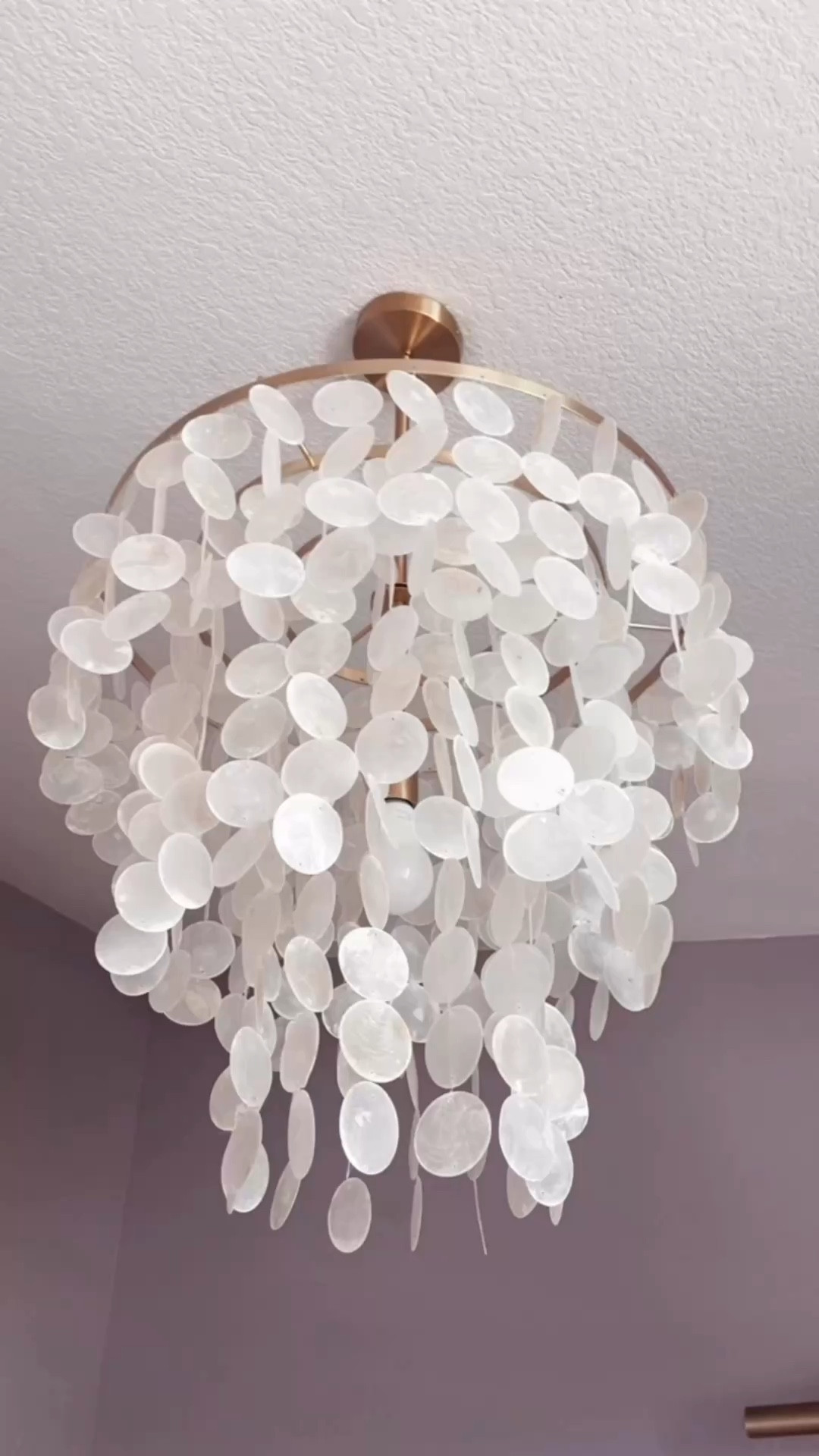 Capiz shell light pendant chandelier on Amazon for under $200. Perfect for a bedroom, bathroom, home office or large walk in closet. 

This one is really nice for the price. Length is adjustable and it works on a sloped ceiling. 

#coastaldecor #beachhouse 

#LTKSaleAlert #LTKHome #LTKstorytime