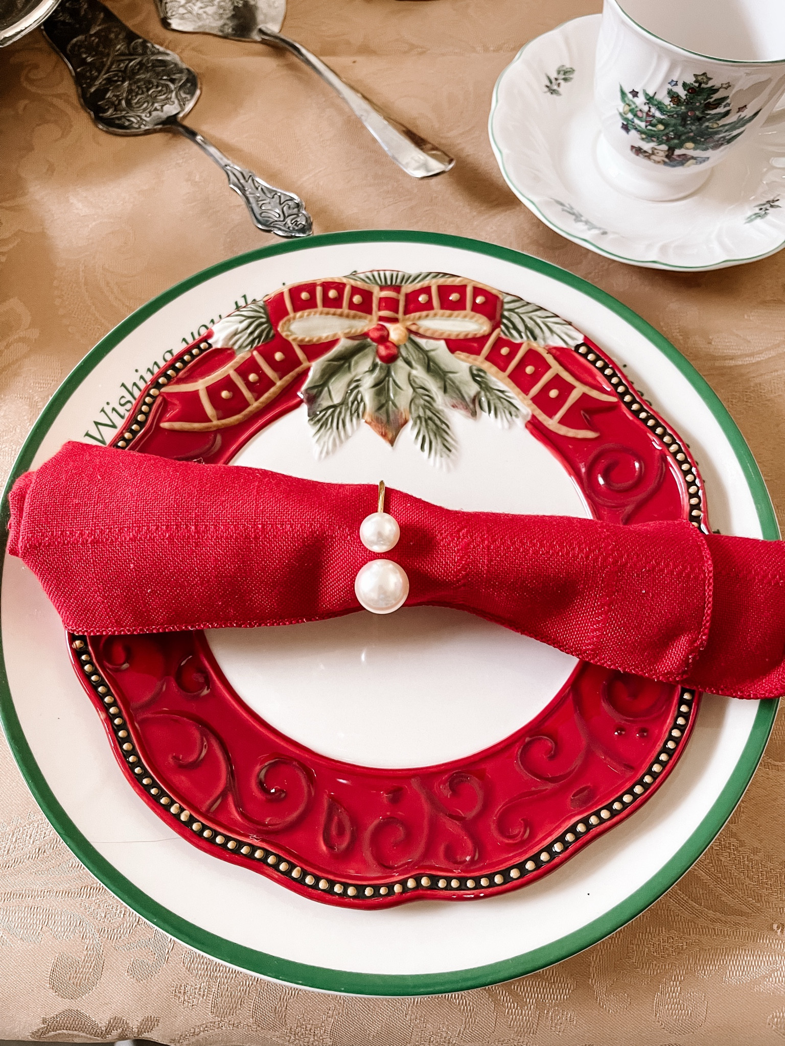 My mom has a beautiful Christmas table scape. With her plates, she has pearl napkin rings and it looks so pretty!

#LTKParties

#LTKSeasonal #LTKHoliday #LTKHome