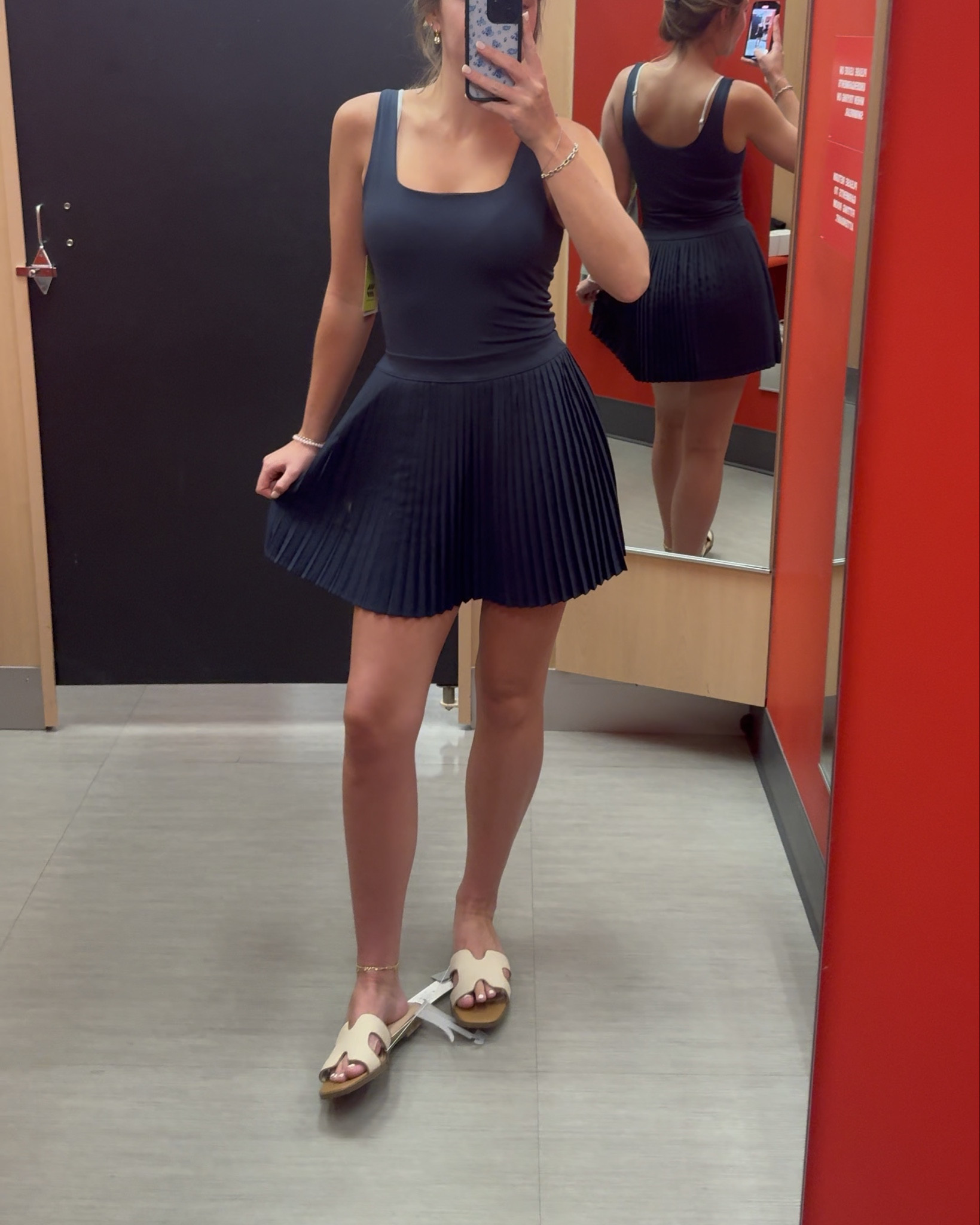 The cutest athletic dress ive ever seen!! This dress is so flattering. It has built in shorts as well. The navy is perfect for the 4th of July or Memorial Day weekend if you are looking for a casual dress! 

#LTKFindsUnder50 #LTKActive #LTKStyleTip