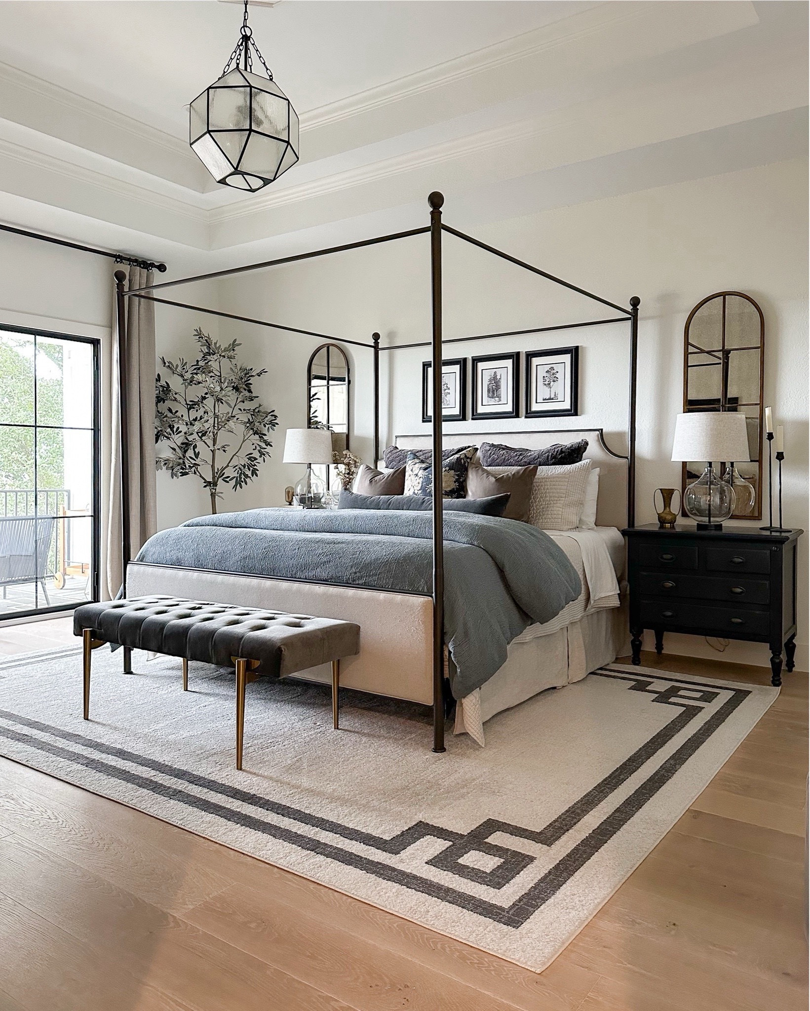 Our primary bedroom decor! We’ve owned this affordable canopy bed for 3 years and it’s fabulous for the price! I recommend the bedskirt with it to hide the side rails. My nightstands are a soft black color. Curtains are the color Oatmeal, and wall color is Alabaster by SW. Rug is the Beige! Bedding details below ⤵️

Duvet Cover: Stormy Blue
Duvet Insert: Ultra Plush
Quilt: Frost Gray
Euro Shams: Gray
Throw Pillows: Taupe, 18”x18"
Lumbar Pillow: Slate, 12”x46"
*Linking my favorite mattress topper that makes our bed feel like a CLOUD! And my favorite sheets (the are the BEST sheets brand!).

#LTKFindsUnder100 #LTKStyleTip #LTKHome