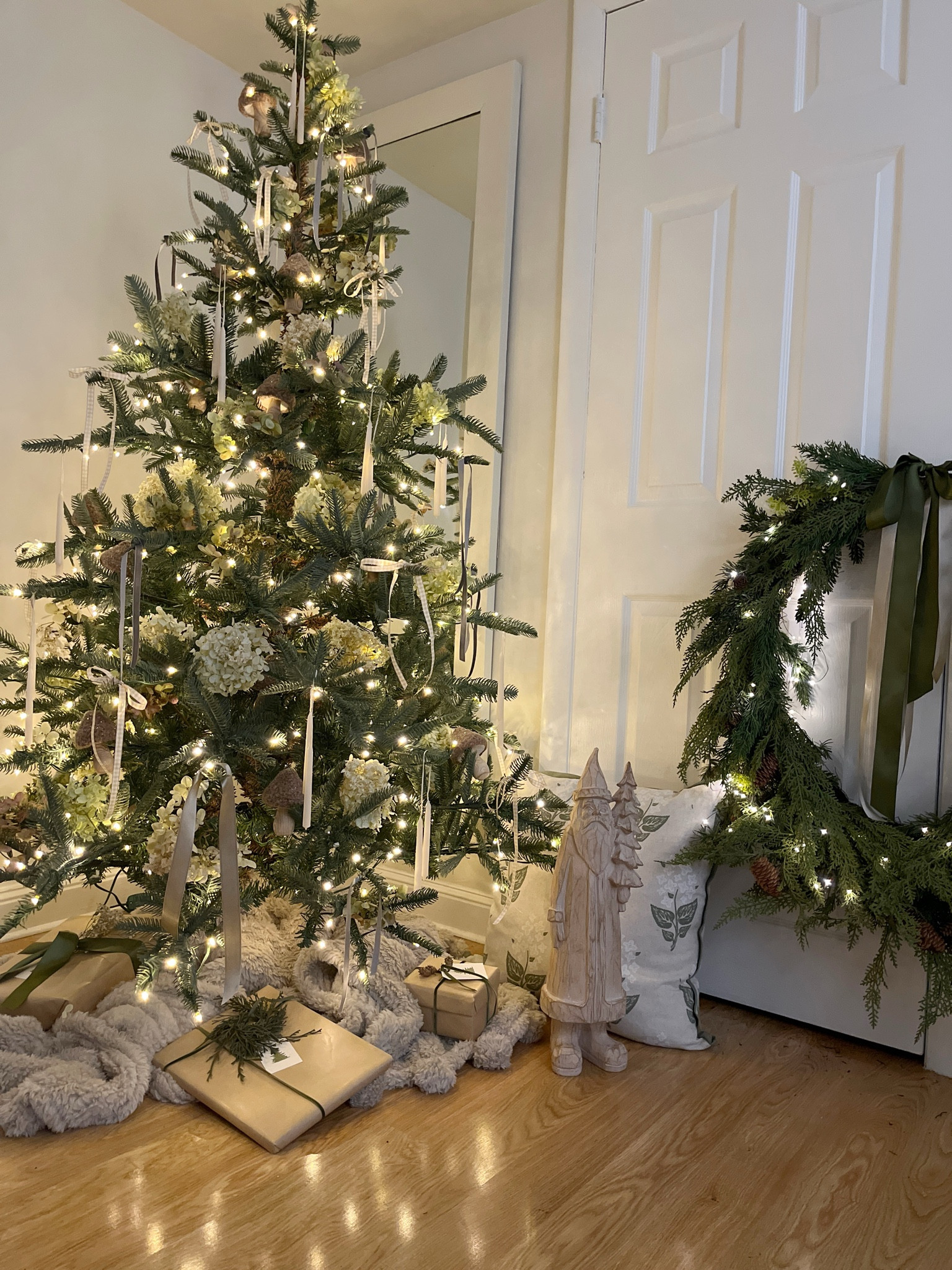 Sharing my King of Christmas Tree! 

It’s a 6ft King Noble Fir with 400 led warm white lights 
Tree linked is a 7ft king Noble Fir. 

I decorated with dried Hydrangeas, small candles, velvet ribbons and wooden mushrooms.  The tree is beautiful as it is so kept it simple!  This is our bedroom tree 

#LTKhome #LTKSeasonal #LTKHoliday
