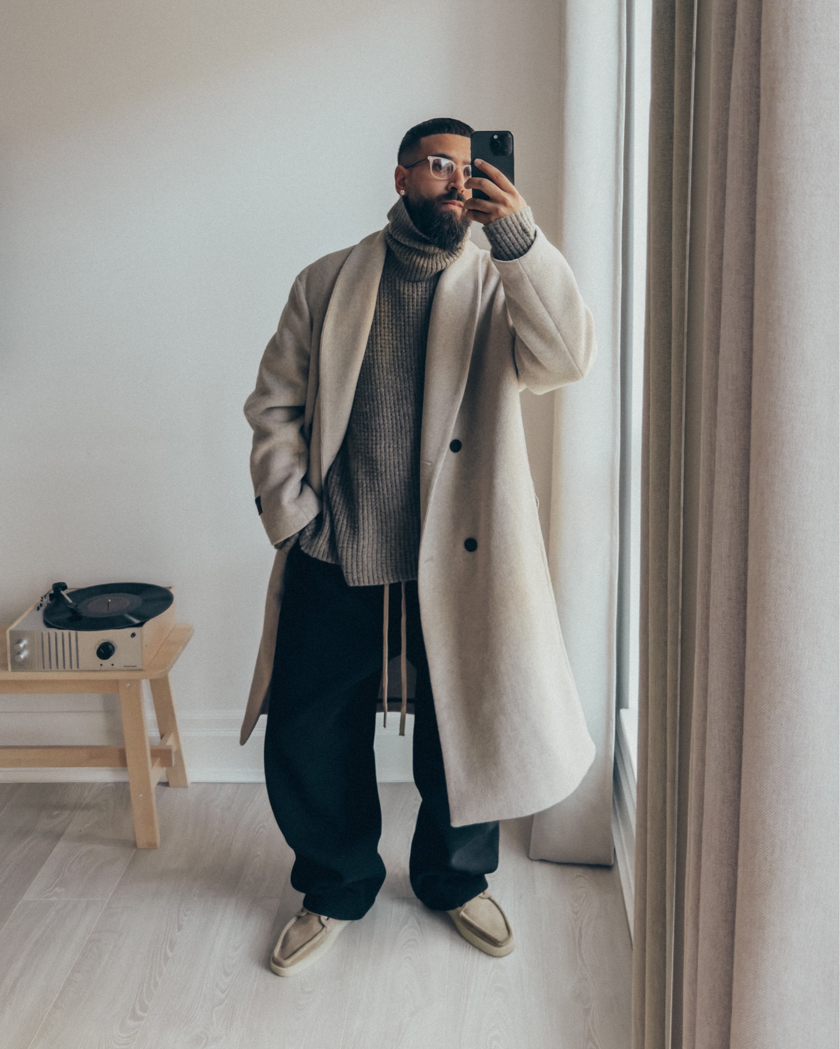 FEAR OF GOD ESSENTIALS Heavy Waffle Turtleneck Sweater in ‘Heather Gray’ (size M) and Relaxed Brushed Sweatpants in ‘Black’ (size M). FEAR OF GOD Boat Hi Boots in ‘Daino’ (size 41EU). ROOTS CANADA Alma Long Coat in ‘Oat Milk’ (size XXL). FEAR OF GOD x BARTON PERREIRA Glasses in ‘Matte Taupe’. A relaxed and elevated men’s outfit that’s cozy and comfortable, for a cool Fall / Winter Day / Night out. Alternative products linked where items are currently sold out.

#LTKStyleTip #LTKMens