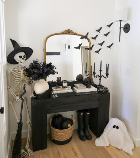 H O M E \ Halloween console table in my entry 🖤🖤 skeleton, bats, skull, crystals and more! Many amazon finds 

#LTKhome #LTKHalloween