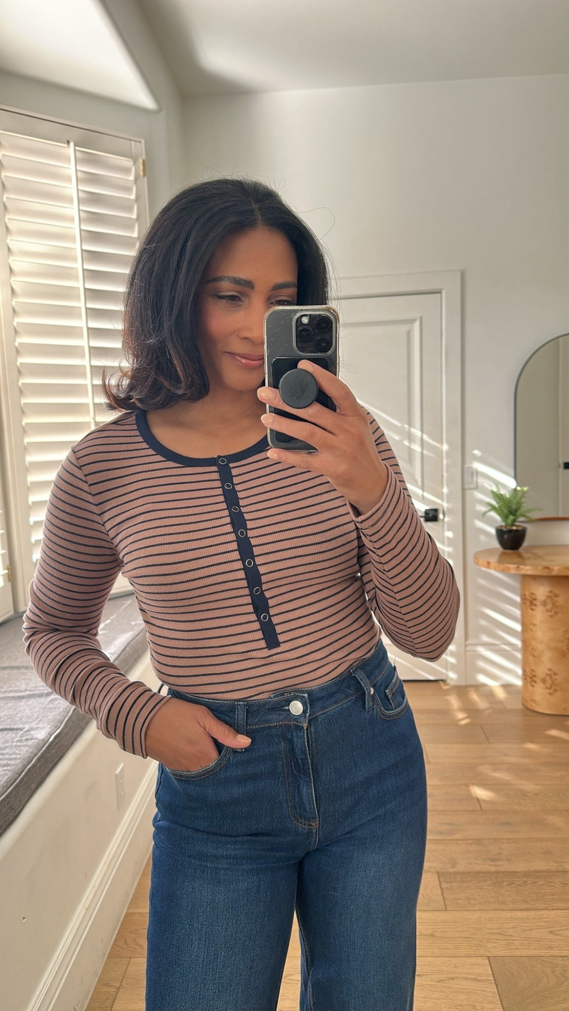 Super cute striped long sleeve henley.  Fits true to size.

#LTKOver40