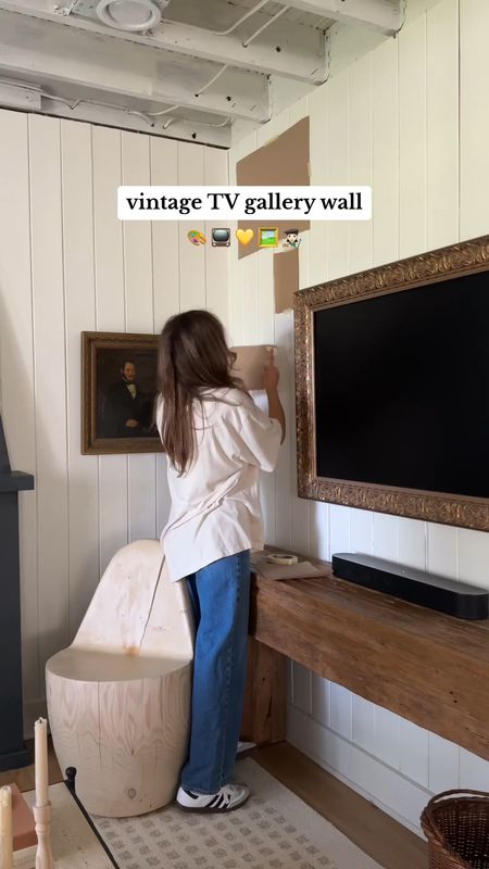 Turned this wall in my living room into a gallery wall 🤎 I’m loving how it pairs with the frame TV😊 I always make templates for the art to help figure out the layout. It really helps you visualize and prevents putting a bunch of holes in the walls #gallerywall #vintageart