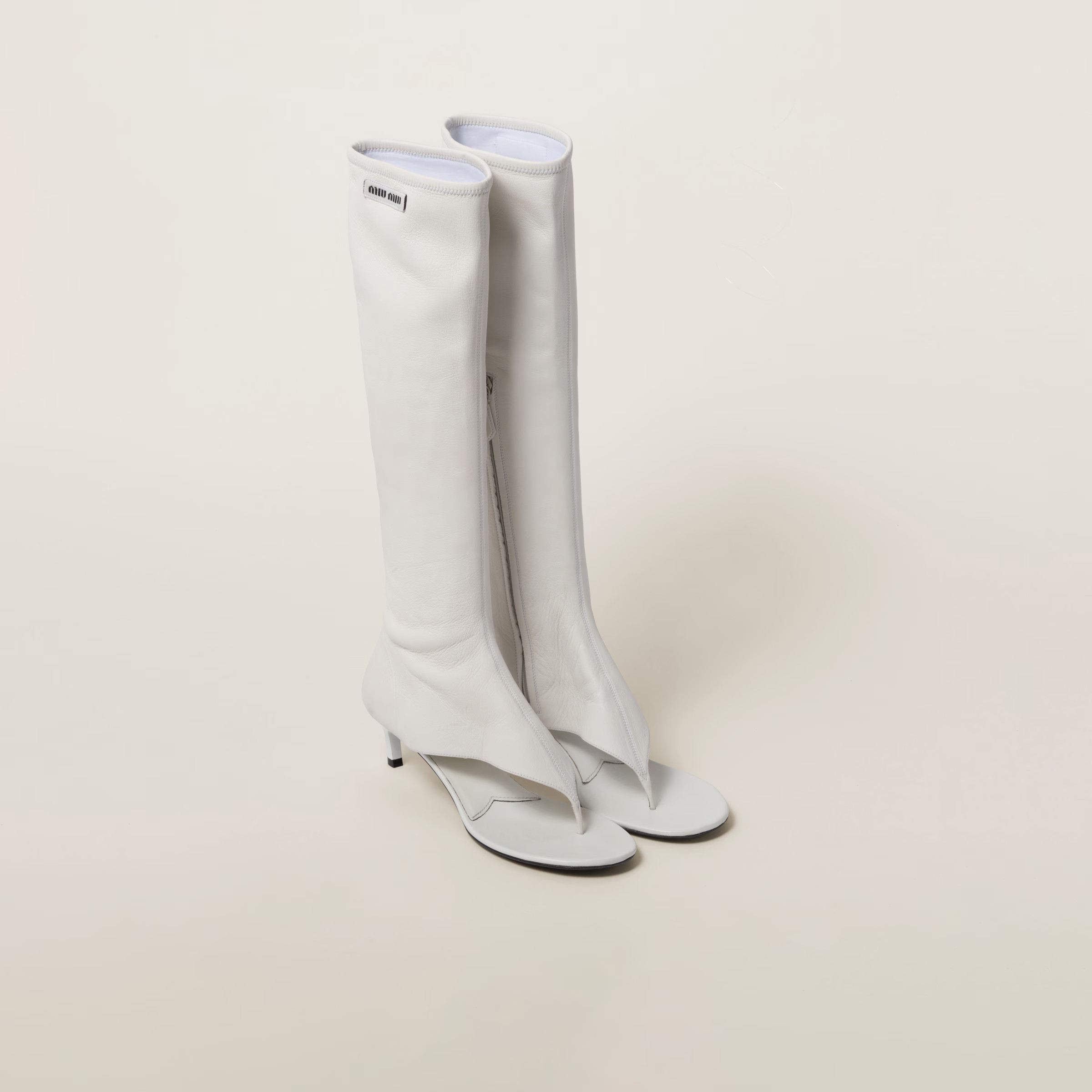 Stretch nappa leather thong boots | Miu Miu US