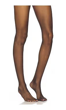 Wolford Luxe 9 Tights in Black from Revolve.com | Revolve Clothing (Global)