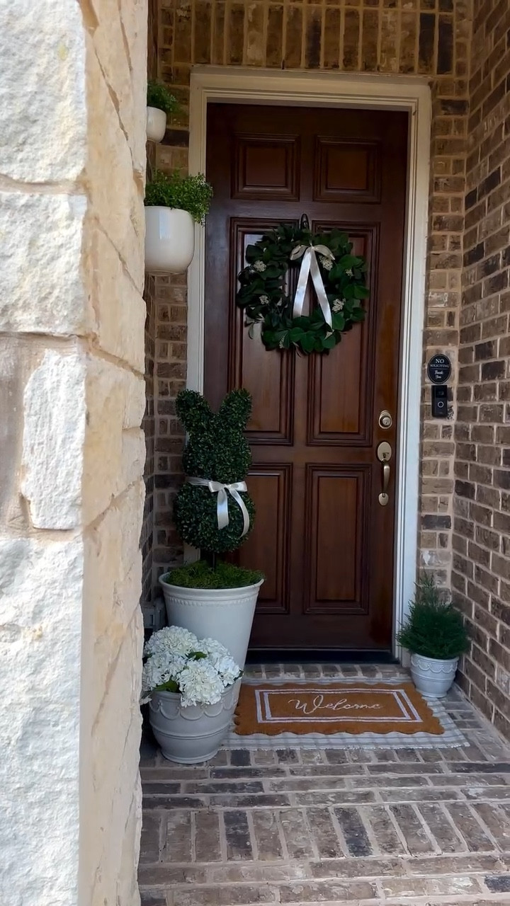 It’s the bunny topiary for me 🐰 

I polished up the door, layered in fresh mats, and added planters with faux hydrangeas to make it feel alive again. The bunny topiary and wreath were the finishing touch and now walking up to our house just feels happy.

#LTKSeasonal #LTKHome