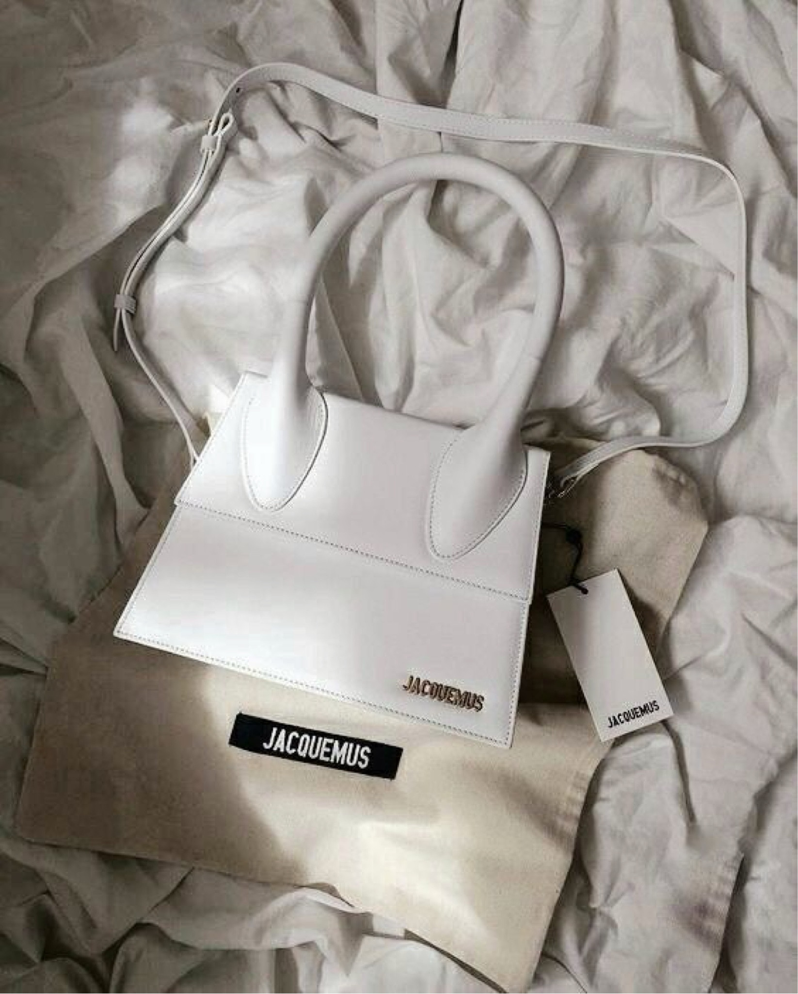 Upgrade your style with the Jacquemus Medium Chiquito bag, now available for just €547, down from €913! Don't miss out on this 40% off sale. Grab it in white while stocks last!

#LTKbag #LTKsummer #LTKsale