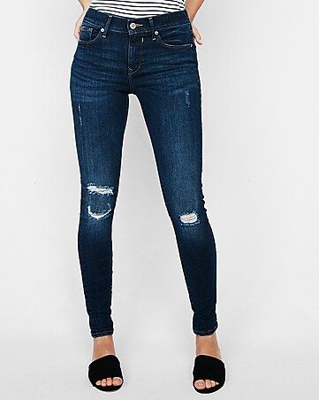 Mid Rise Dark Wash Ripped Stretch Jean Leggings | Express