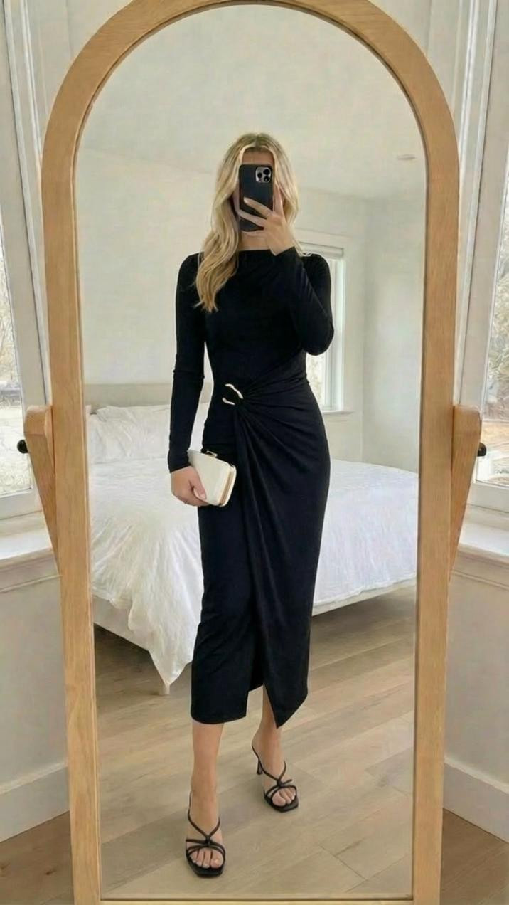 Elegant black midi dress moment 🖤

This long sleeve black draped midi dress is the definition of timeless sophistication. The side ruching and subtle hardware detail create such a flattering silhouette, and the asymmetrical hem adds just the right amount of movement.

Styled with delicate black strappy heels and a neutral clutch for a clean, modern finish — perfect for:

• wedding guest outfits
• fall formal dresses
• cocktail party looks
• date night outfits
• holiday event styling
• minimalist evening wear
• classic black dress outfit ideas
• elevated capsule wardrobe pieces

This is one of those dresses that makes you feel instantly polished with minimal effort.

Simple. Sleek. Unforgettable. 🖤

#blackmididress #elegantstyle #weddingguestdress #minimalistfashion #fallformal #cocktailattire #timelessstyle #datenightoutfit #capsulewardrobe #eveninglook #ltkstyle #classicfashion 

 #LTKSpringSale 

#LTKgrwm #LTKmomlife