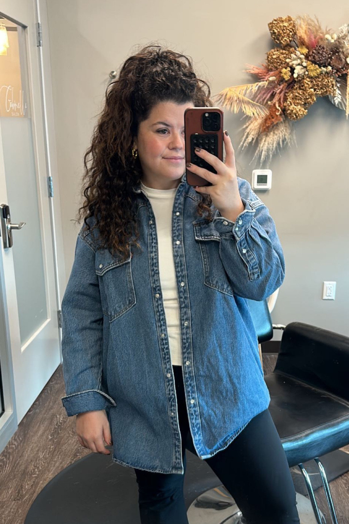 Large in everything. Denim shirt is very oversized and long! 