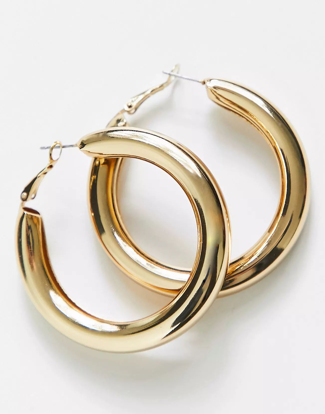 ASOS DESIGN 50mm hoop earrings in thick tube in gold tone | ASOS (Global)